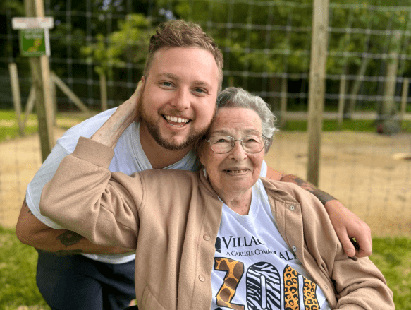 Smiling people in a zoo