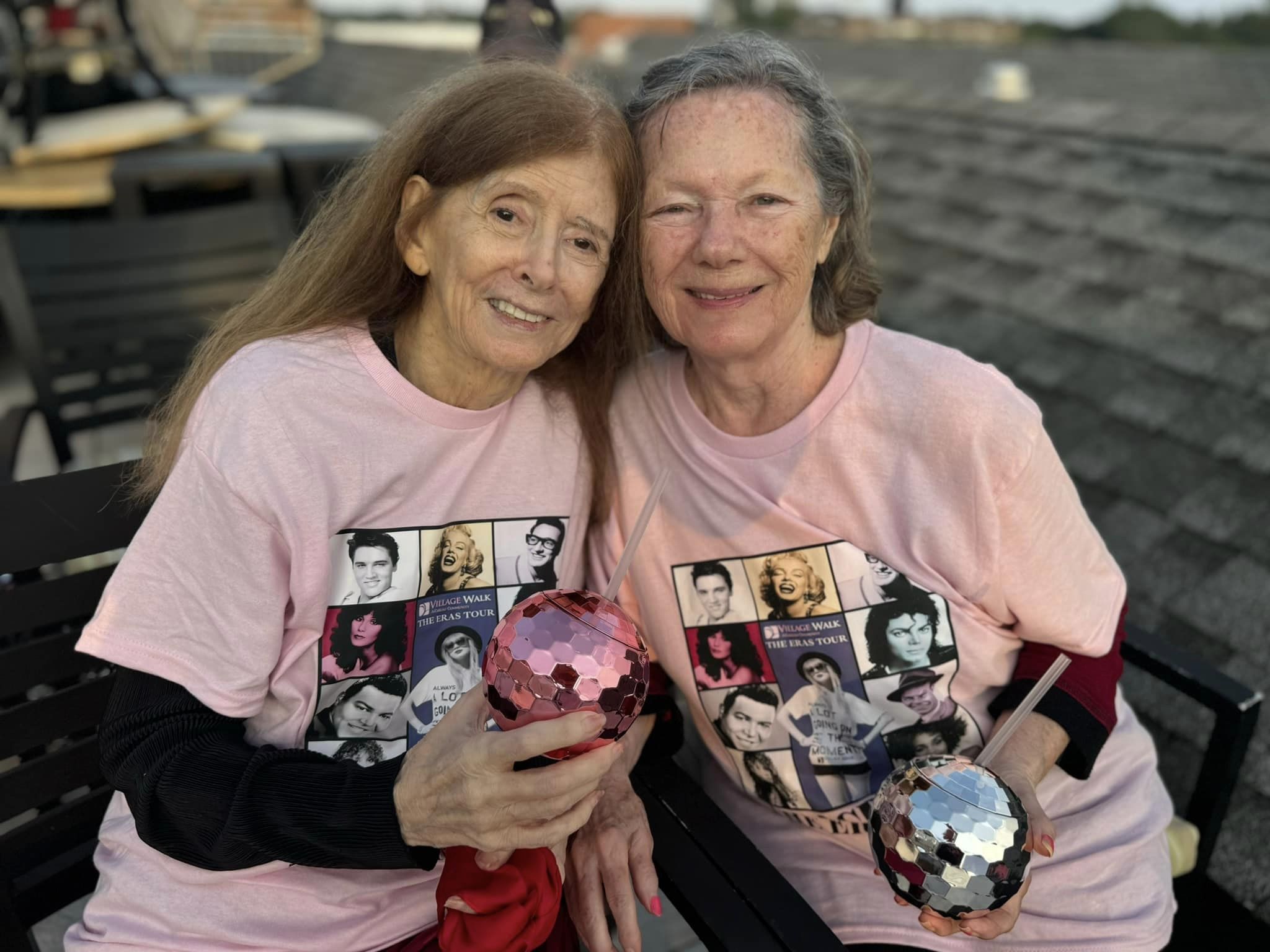 Village Walk assistant living residents with disco ball cups and 80s style t-shirts