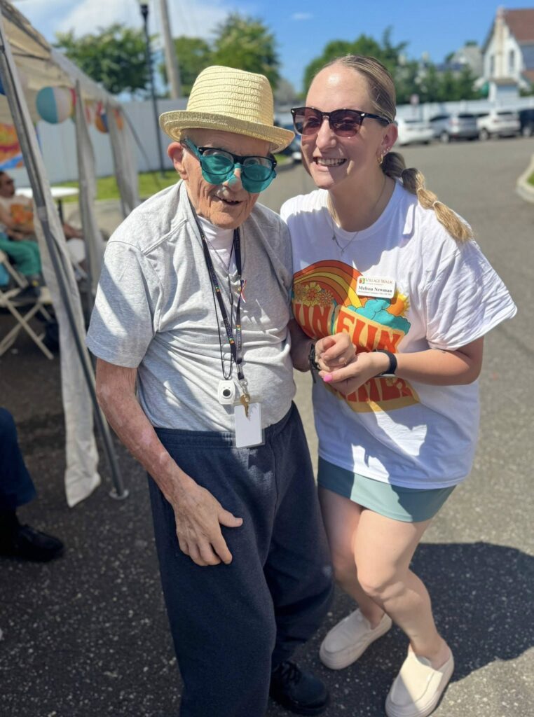 A resident and an assisted living facility worker